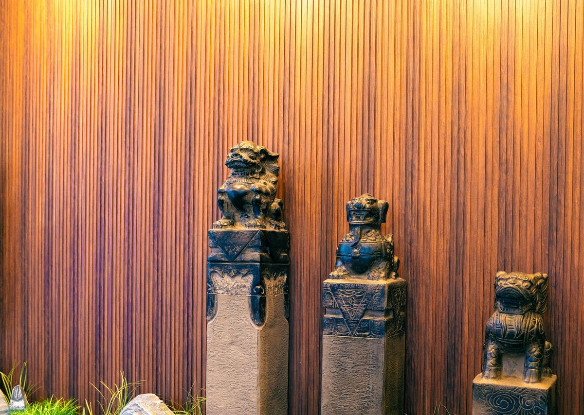 Golden lion statues at the spa entrance